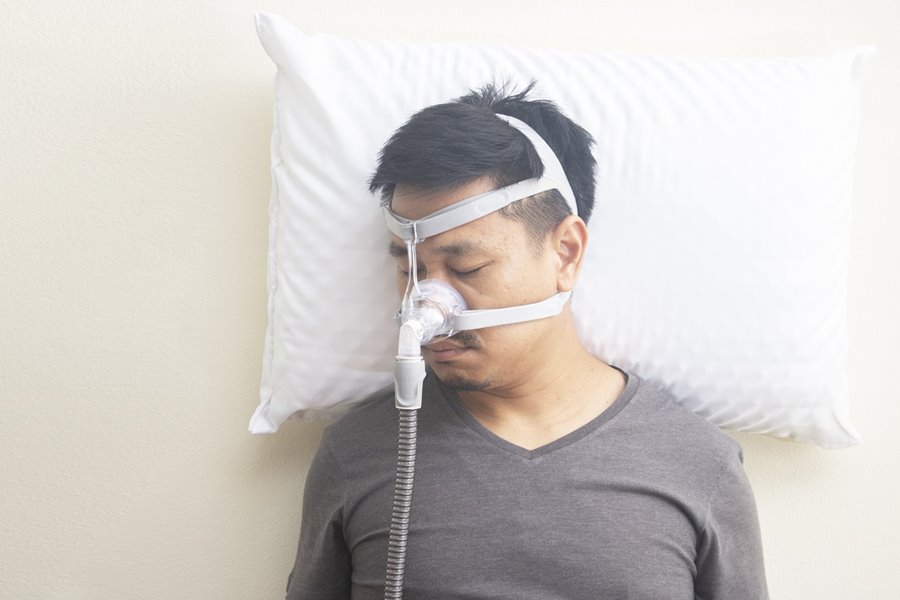 Man with Sleep Apnea Using a CPAP Machine Stock Image - Image of nasal,  sleep: 18586449